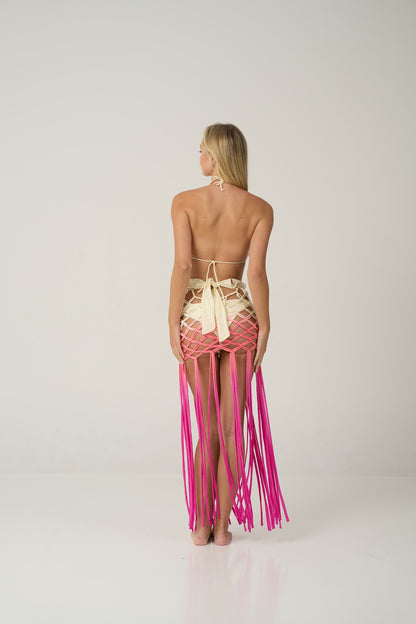 Playful and radiant, the Opal Skirt is inspired by the iridescent hues of the opal gemstone. Its handwoven net design with cascading fringes flows beautifully with every movement, embodying freedom and elegance. Perfect for beach parties, music festivals, or glamorous seaside sunsets.