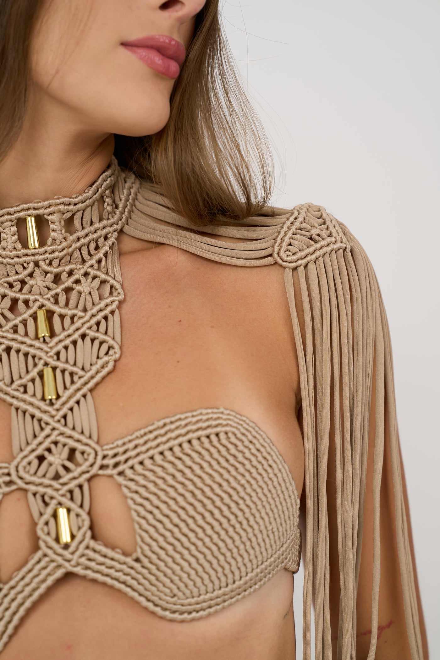 Handcrafted with fine golden threads and delicate fringes, this set embodies the essence of timeless elegance. Each piece is made in limited quantities to preserve its exclusivity — no restocks.Designed for seaside dinners, luxury beach clubs and glamorous escapes under the Dubai sun.